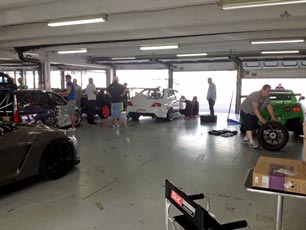 Inside our busy Pit Garage before the Free Practice Session